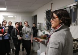 Carolina Bastidas, MIT Sea Grant Research Scientist, speaks to a group of female students in the lab.