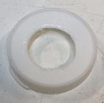 Cap to plastic bottle, with a hole drilled in it