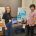 MIT MechE/MIT Sea Grant students Emma Rutherford and Alexander Zhang with their poster and housing design for a high-speed underwater camera.