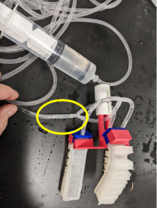 Small section of silicone tubing connected both ends