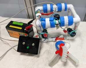 Full system: SeaPerch with powered gripper, controller, battery