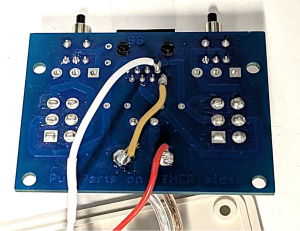 Brown and red wires on the 12 V and Ground tabs