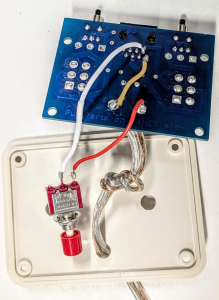 Brown and red wires on the 12 V and Ground tabs