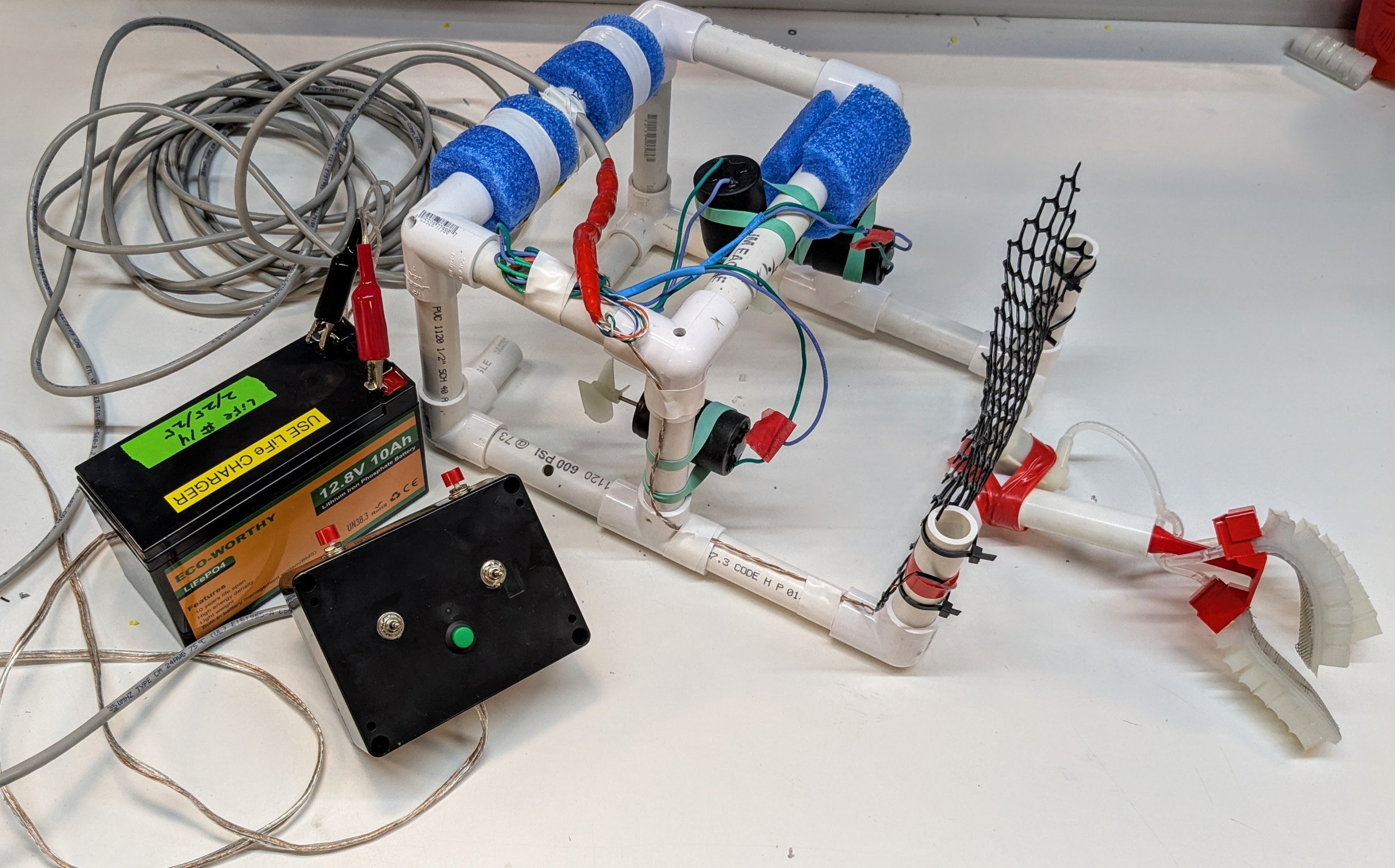 Full system: SeaPerch with powered gripper, controller, battery