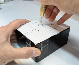 Marking holes with template and punch