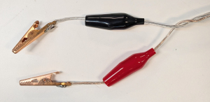 Alligator clips connected to power cord